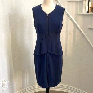Fully lined zipper sheath dress with flattering layer detail. Navy Blue.